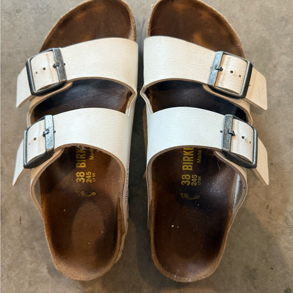 Birkenstock Cream Sandals with Silver Buckles